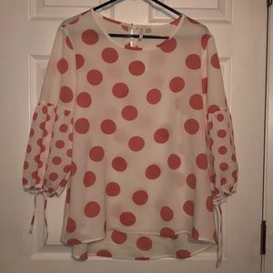 Pink polka dot blouse